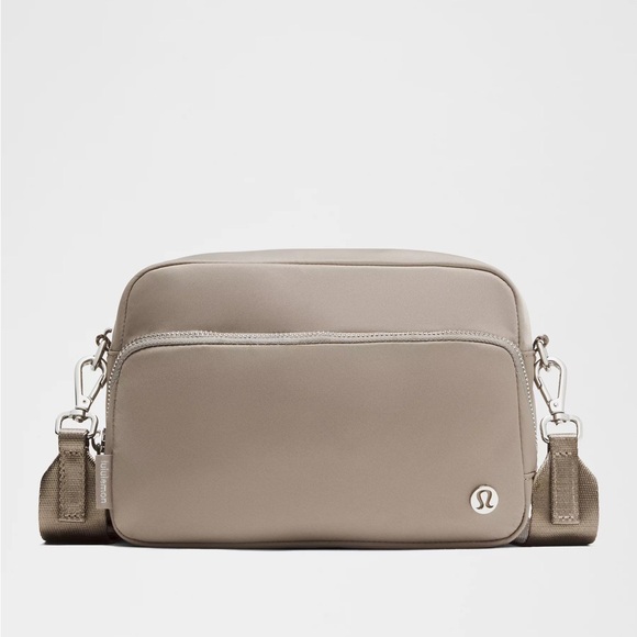 lululemon athletica Handbags - NWT Lululemon Everywhere Crossbody Bag 3L (warm ash grey)